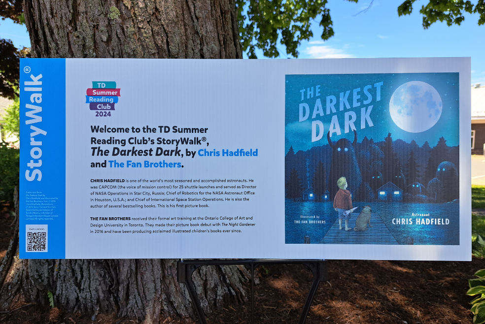 The first Panel of the StoryWalk, "Darkest Dark" by Chris Hadfield.